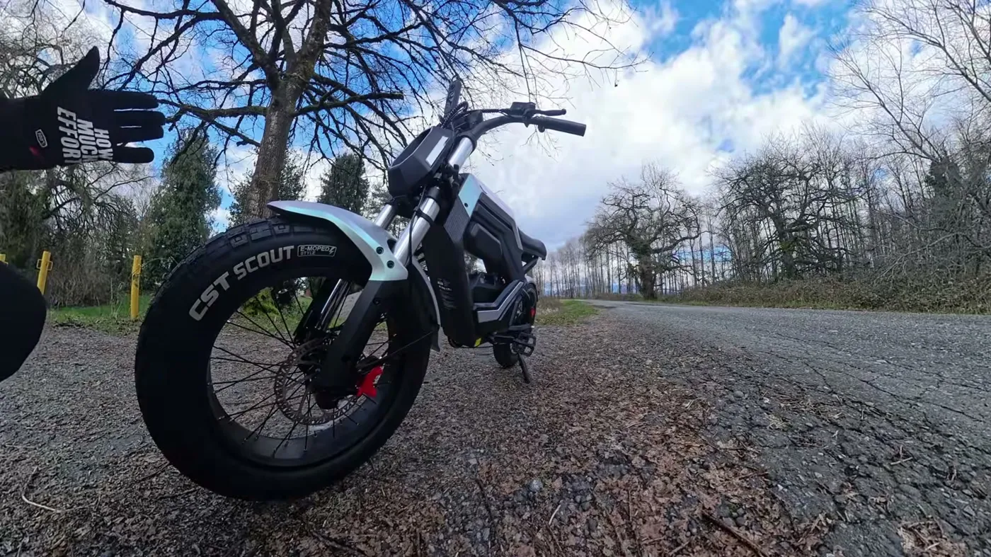 parked on gravel with CST Scout tires