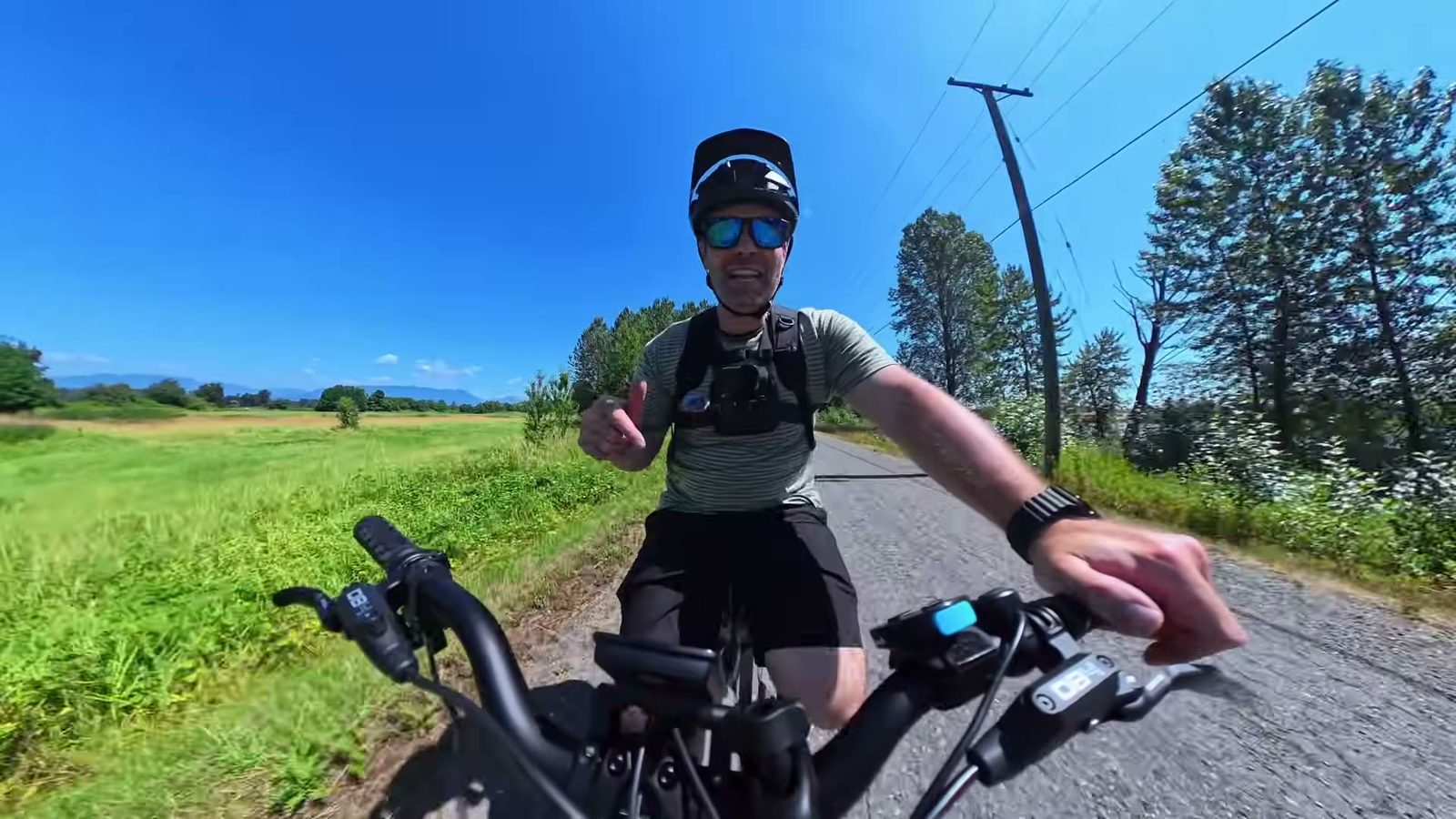 Ben riding the Aventure M on a gravel path