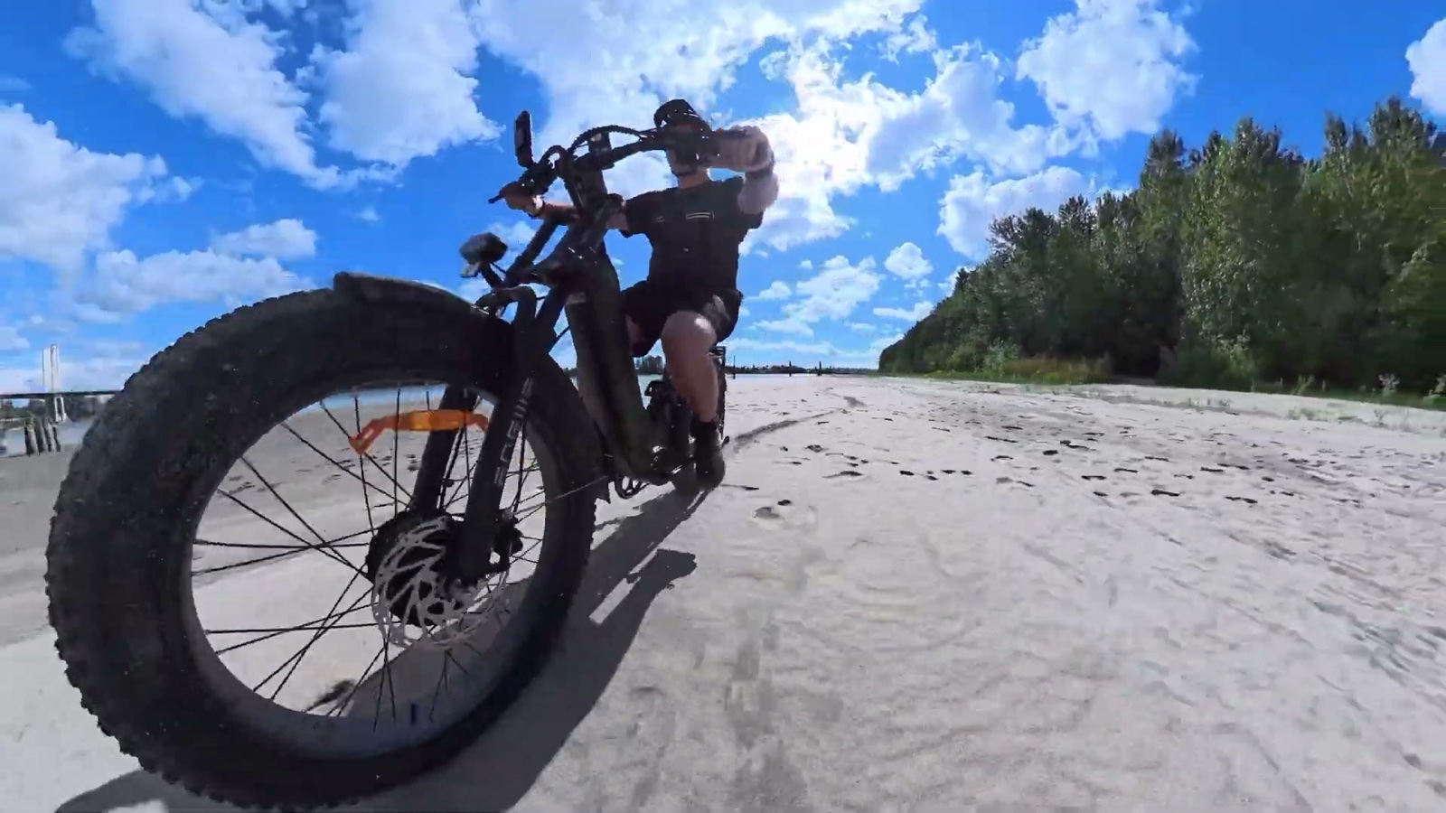 Ben riding the Engwe E26 3.0 on the beach