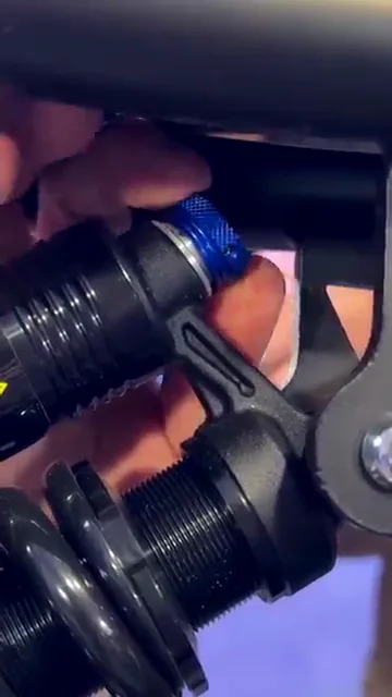 Rear shock adjuster