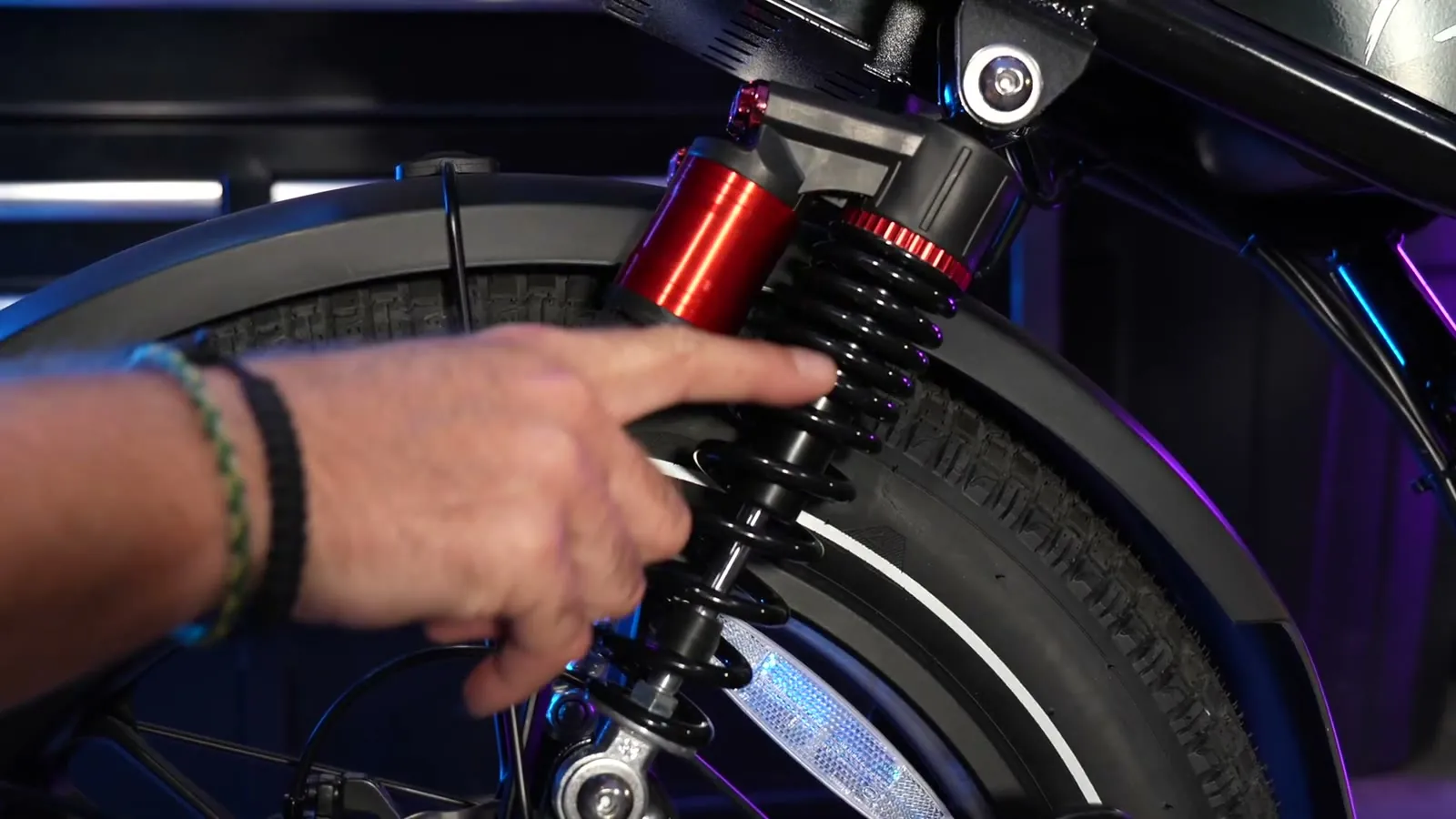 Ben compressing the Heybike Titan rear shock by hand
