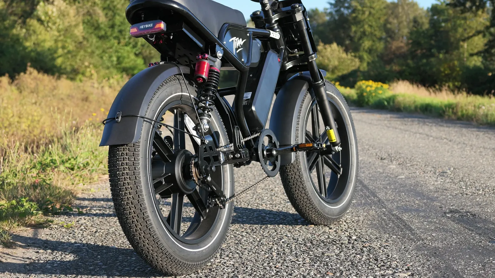 Heybike Titan rear three-quarter on a gravel path