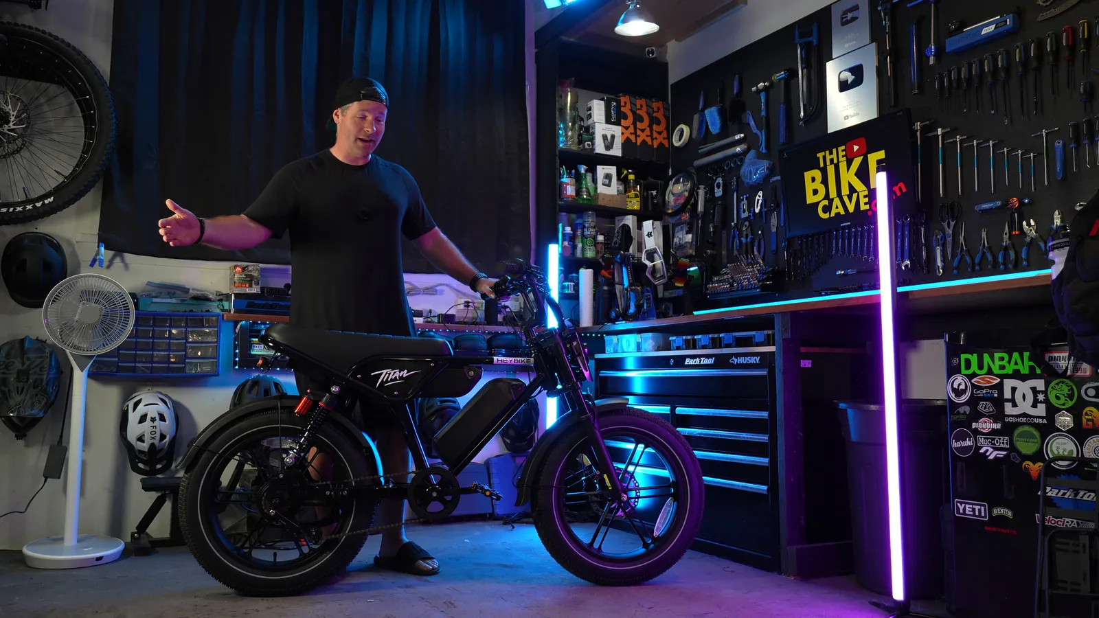 Ben standing beside the Heybike Titan in The Bike Cave studio