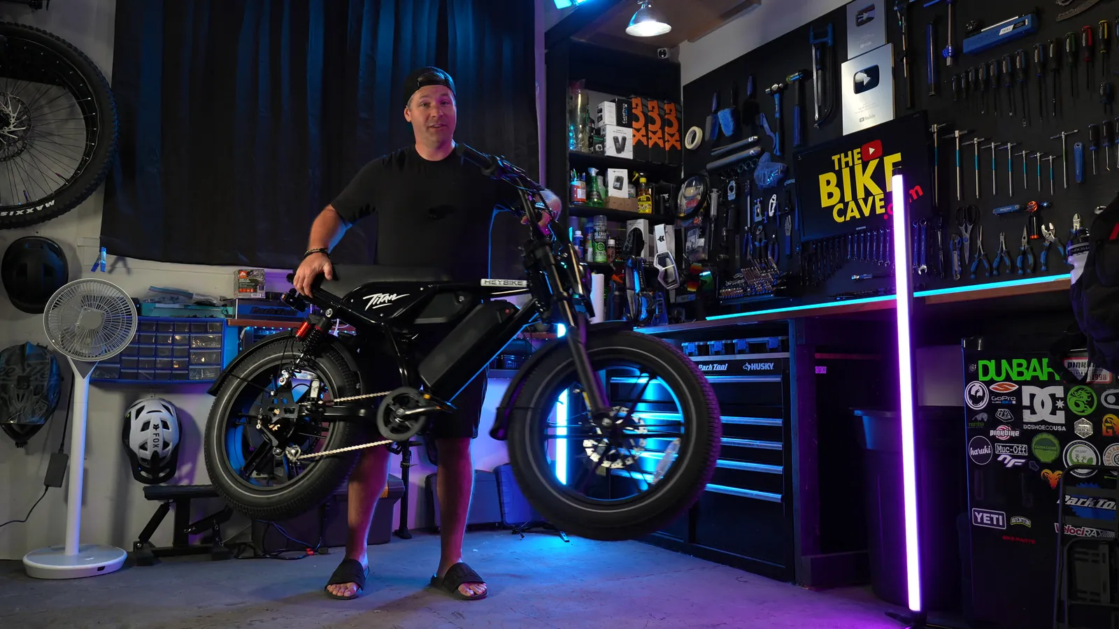 Ben lifting the front of the Heybike Titan in the studio