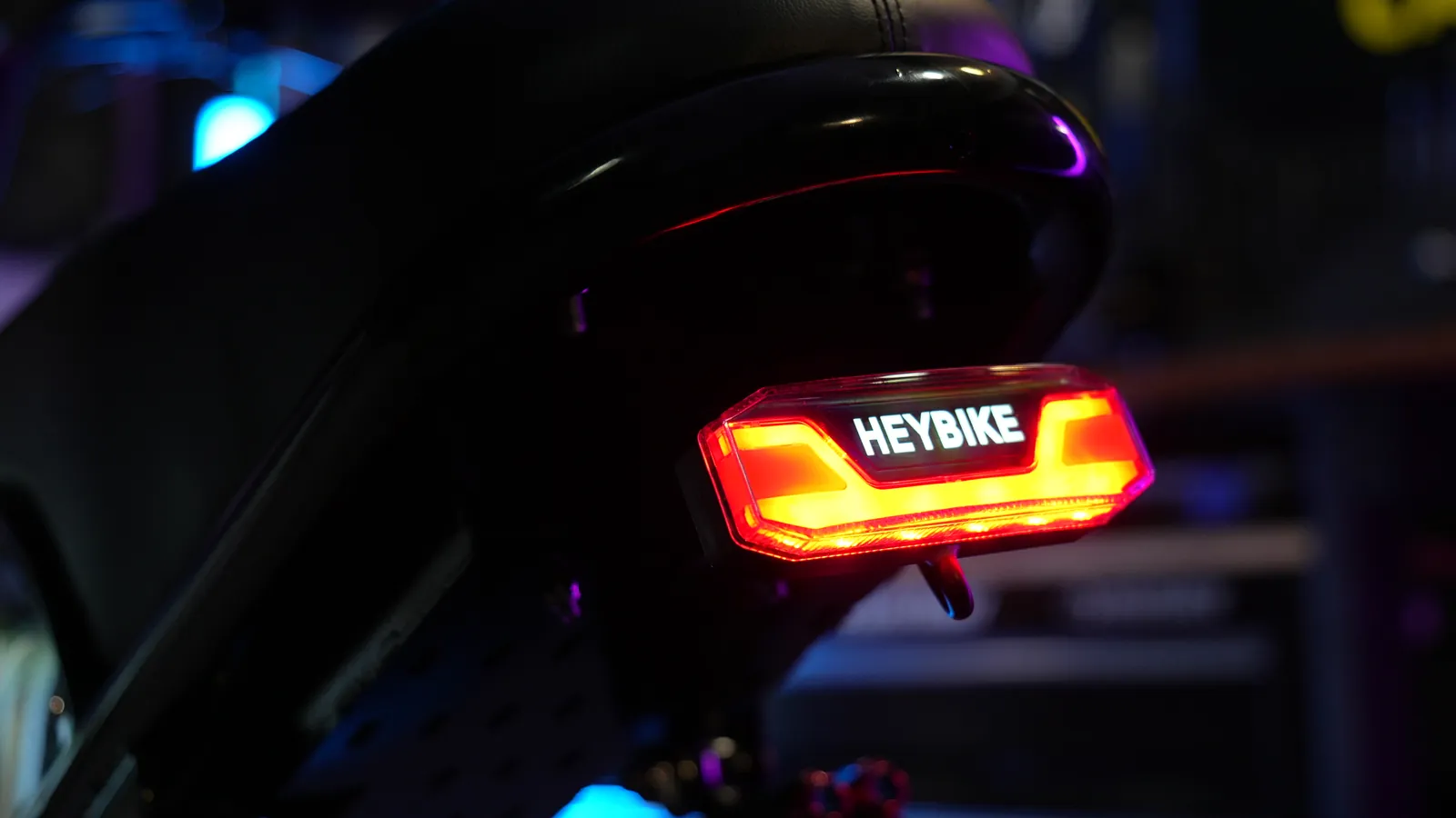 Heybike Titan taillight lit red in the studio