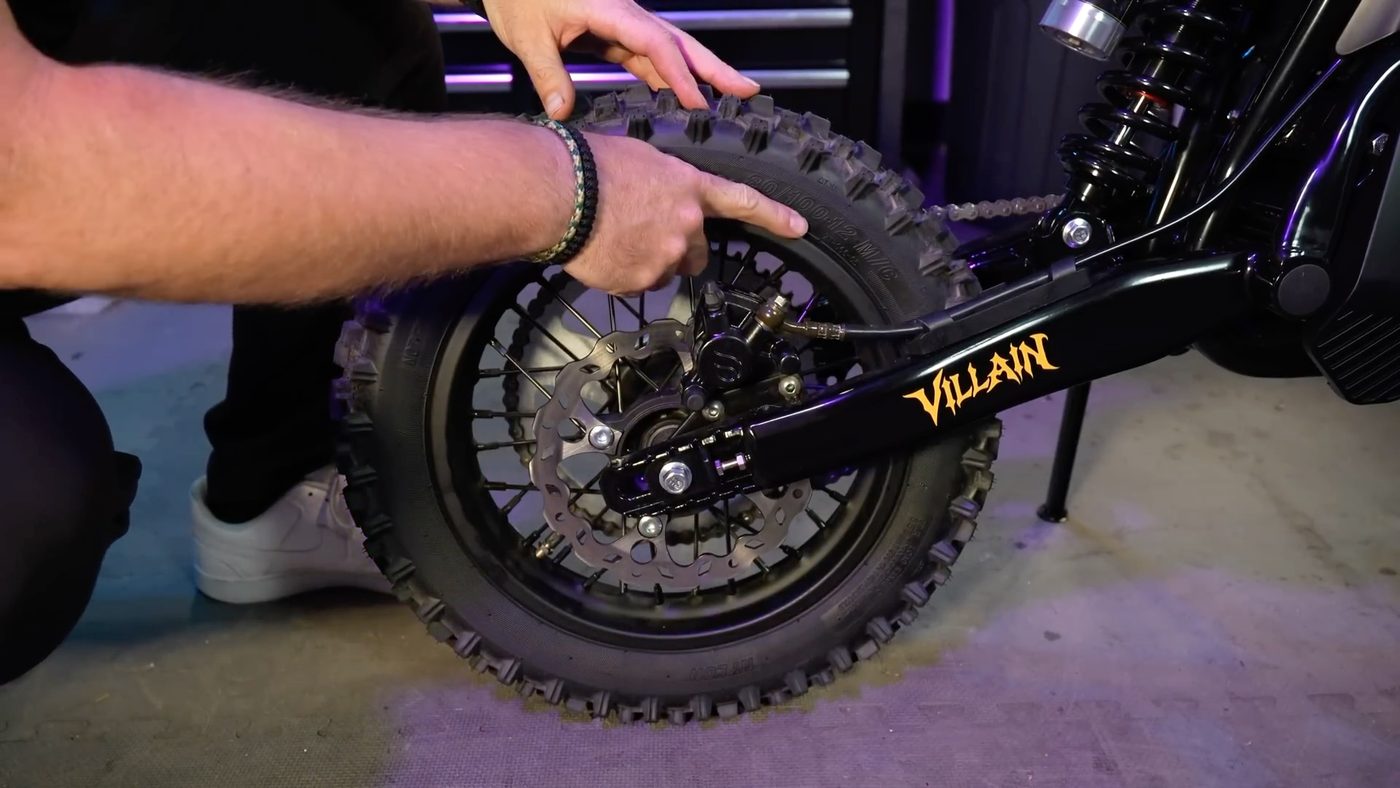 Rear 80/100-12 dirt tire and Villain swingarm