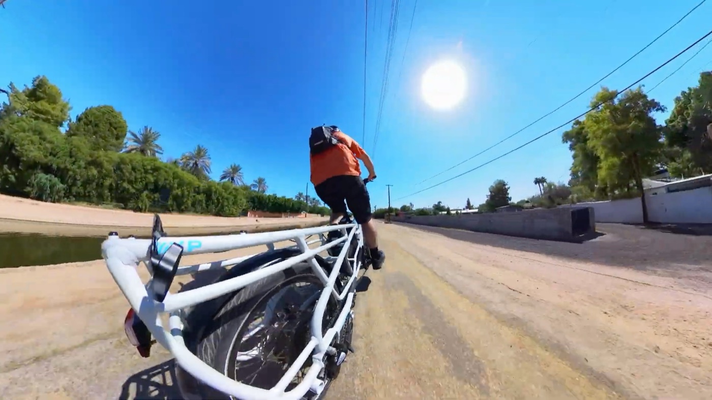 Leaning the long XPedition 2.0 through a turn at speed