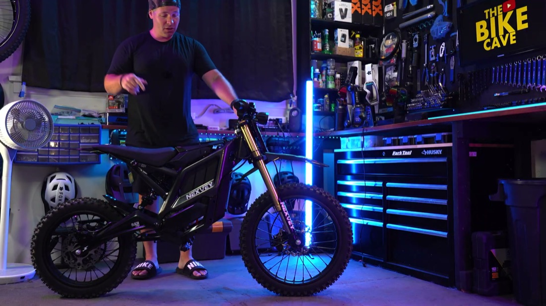 Ben standing next to the Nexvey Flash Pro in the shop