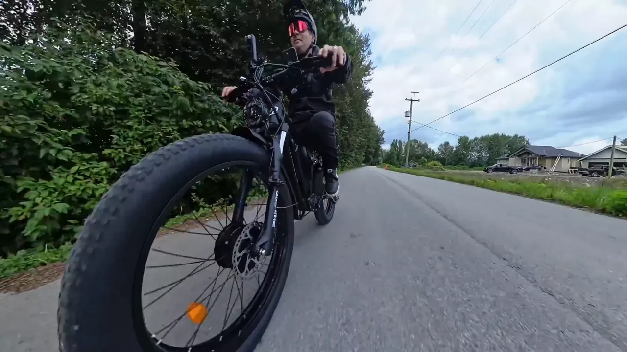 The Philodo Forester 60V front wheel on a road