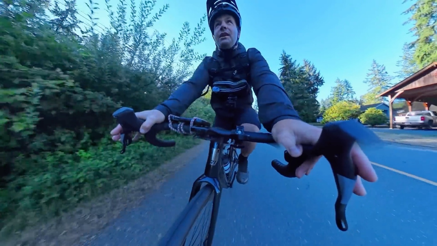 Riding the CF Racer1 at speed on the road during the top speed run