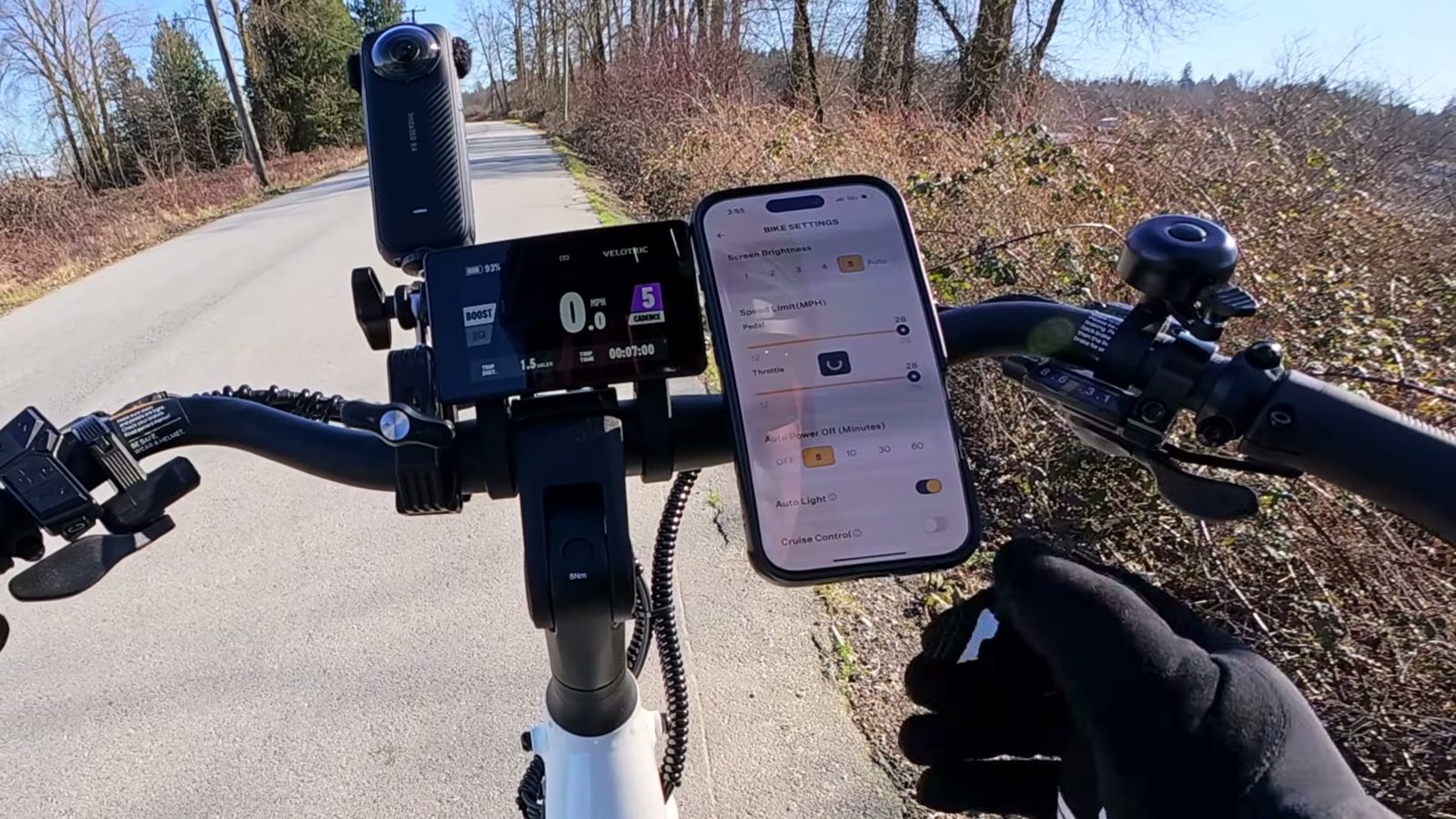 Phone mounted on the bars showing the Velotric app bike settings screen