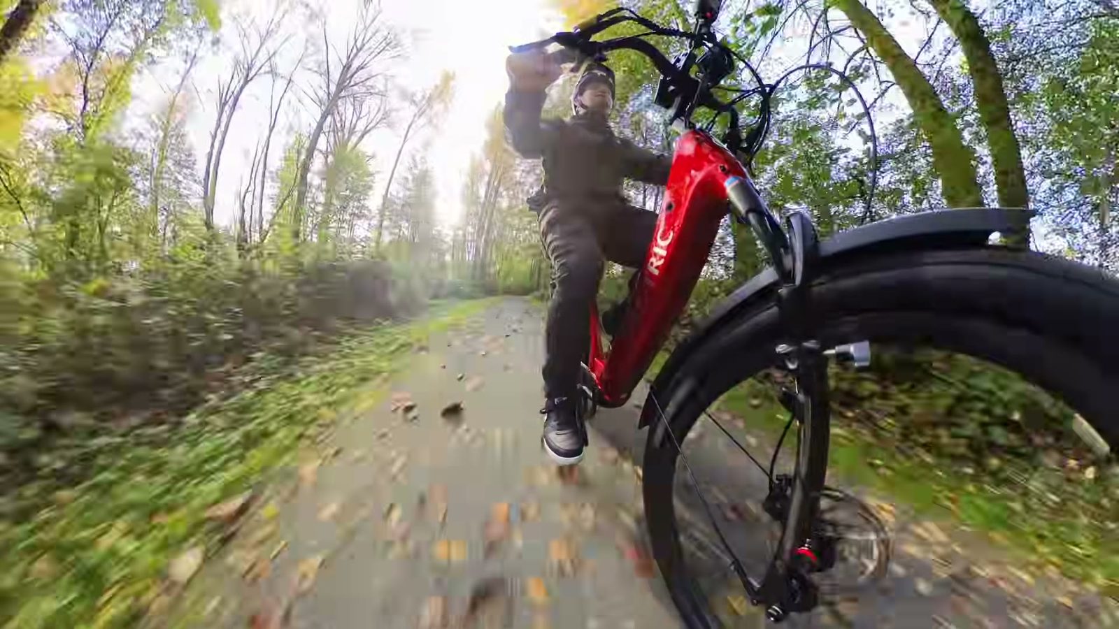 Riding the Discover 2 along a leafy gravel trail