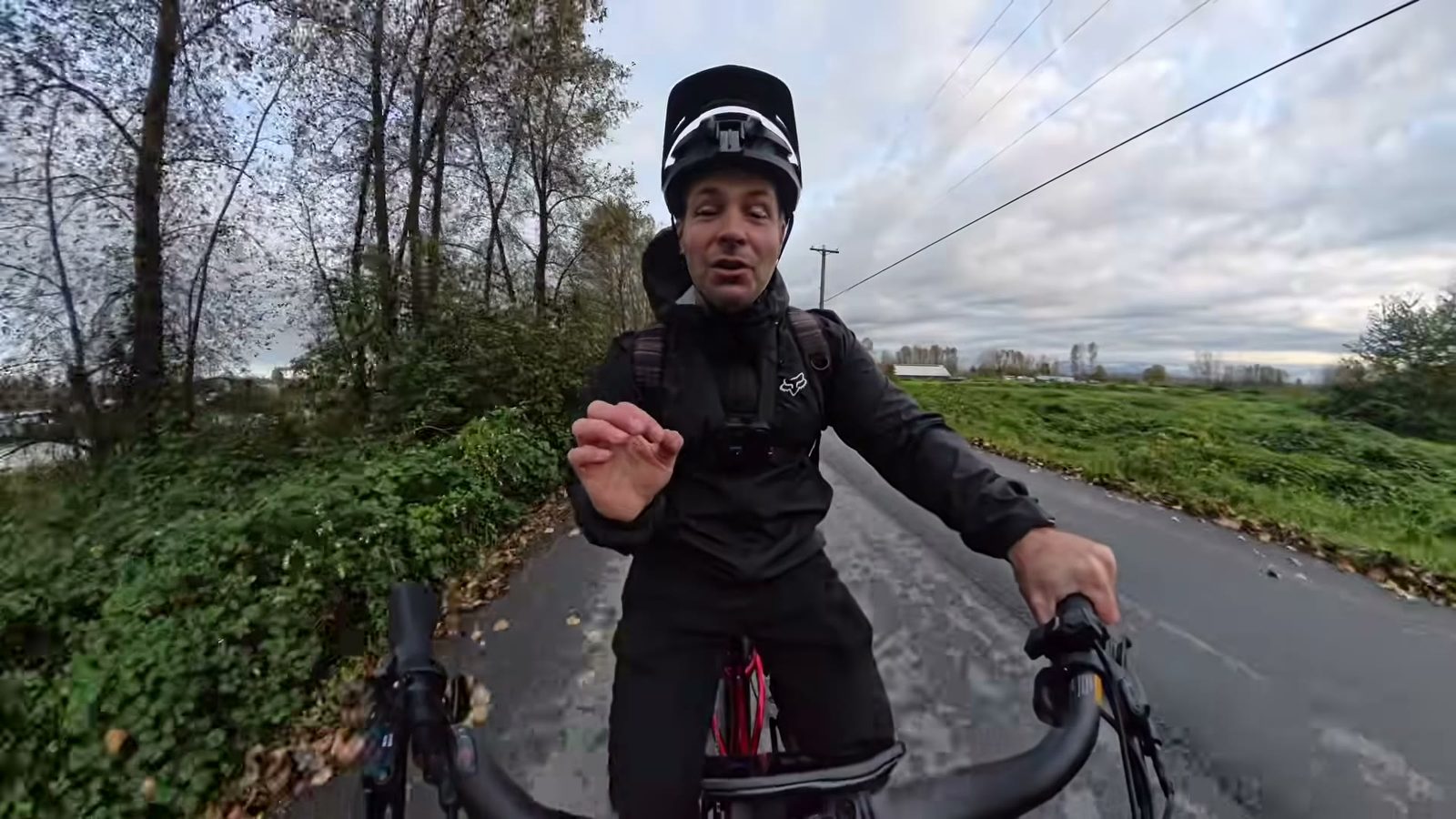 Ben riding the Discover 2 on a riverside path