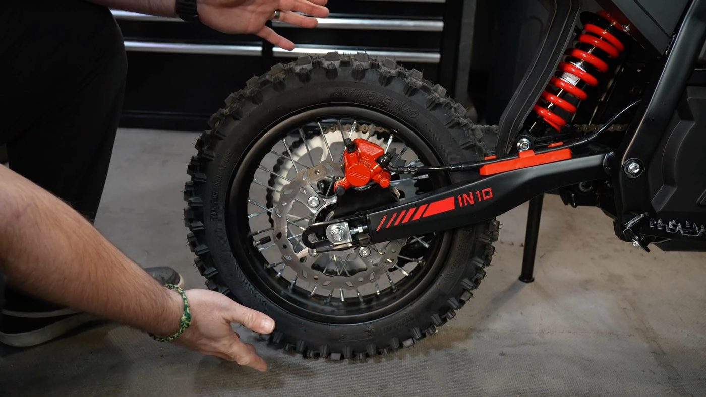 Rear 80/100-12 tire, red caliper and IN10 swingarm