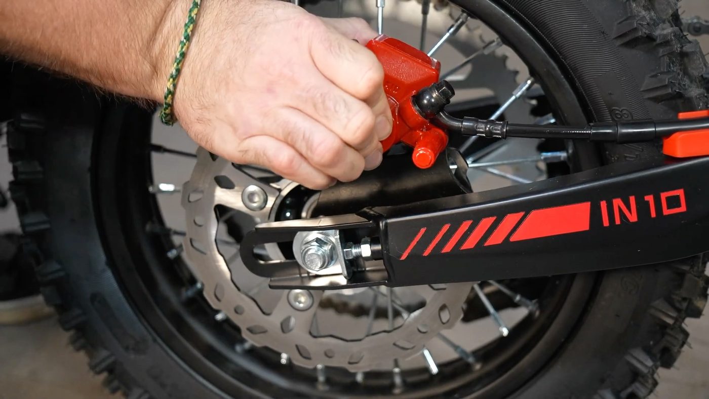 Rear brake caliper and rotor