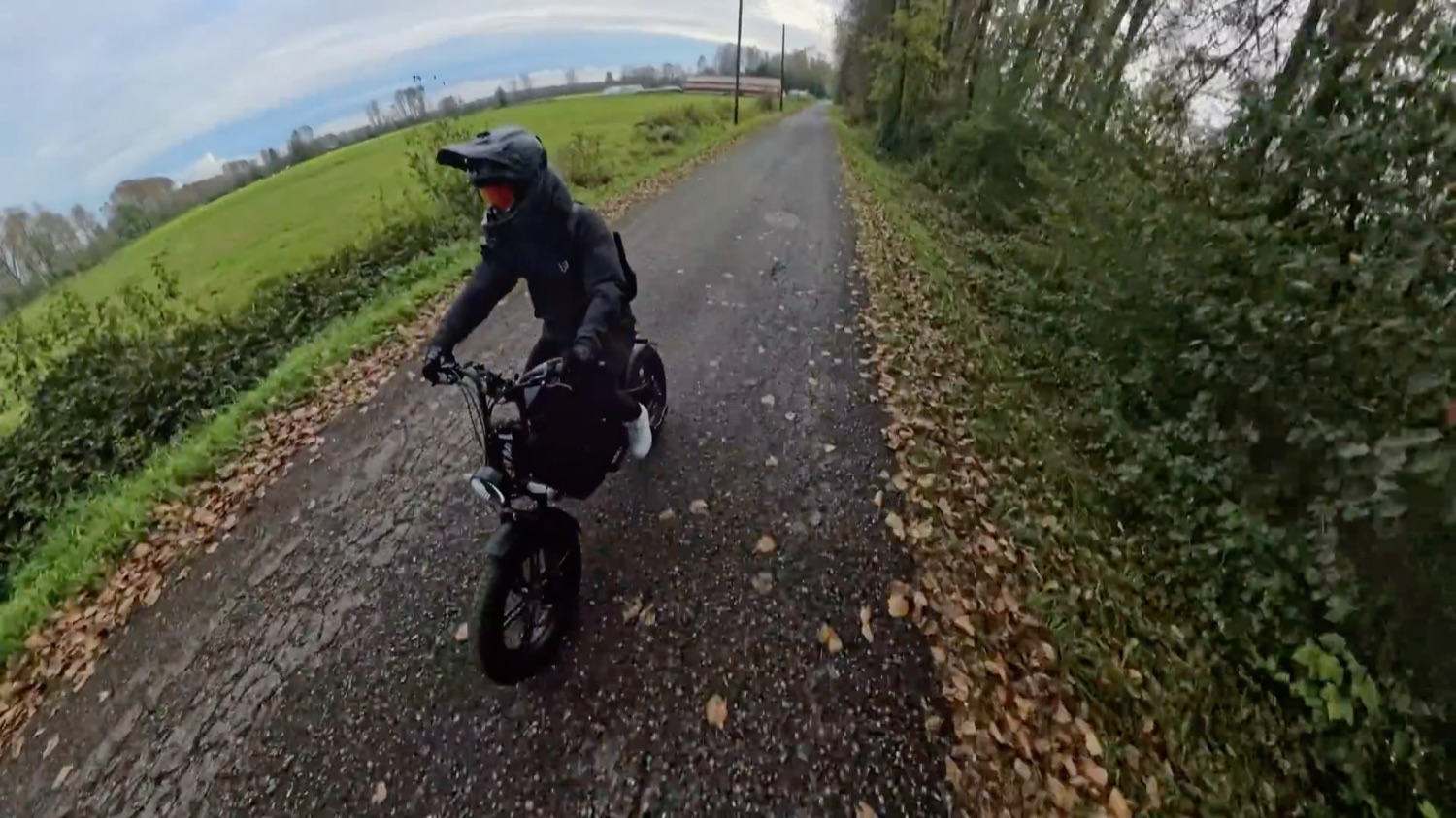 Riding the Motor Goat away down a leafy lane