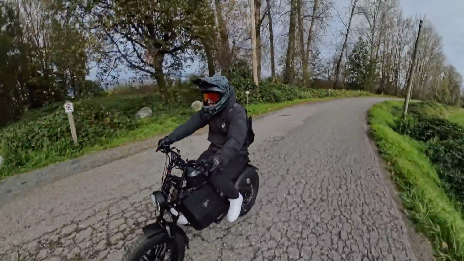Motor Goat on a tree-lined country road