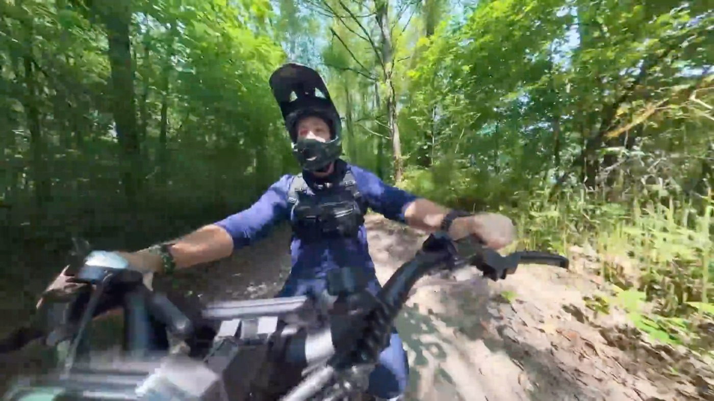 Riding the Ariel Rider Mudd on a forest trail
